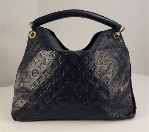 louis vuitton artsy black fake|Louis Vuitton black leather tote.